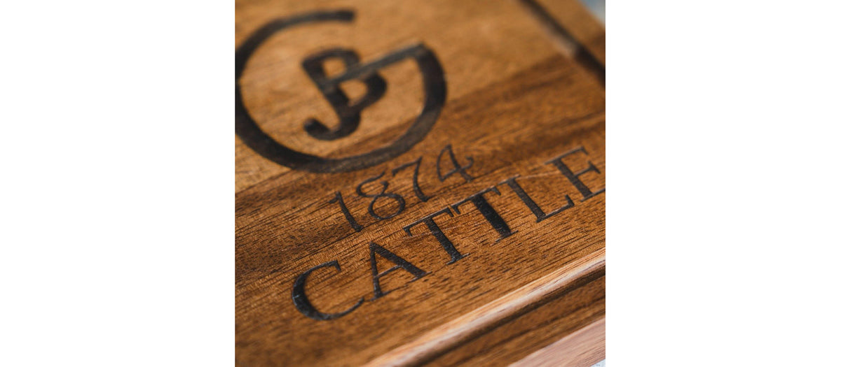 The 1874 Cattle brand burned into wood