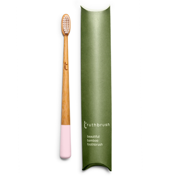 Truthbrush bamboo toothbrush in Petal Pink with medium castor-oil bristles