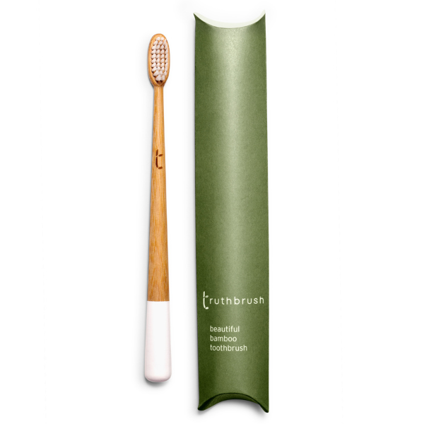 Truthbrush bamboo toothbrush in Cloud White with medium castor-oil bristles