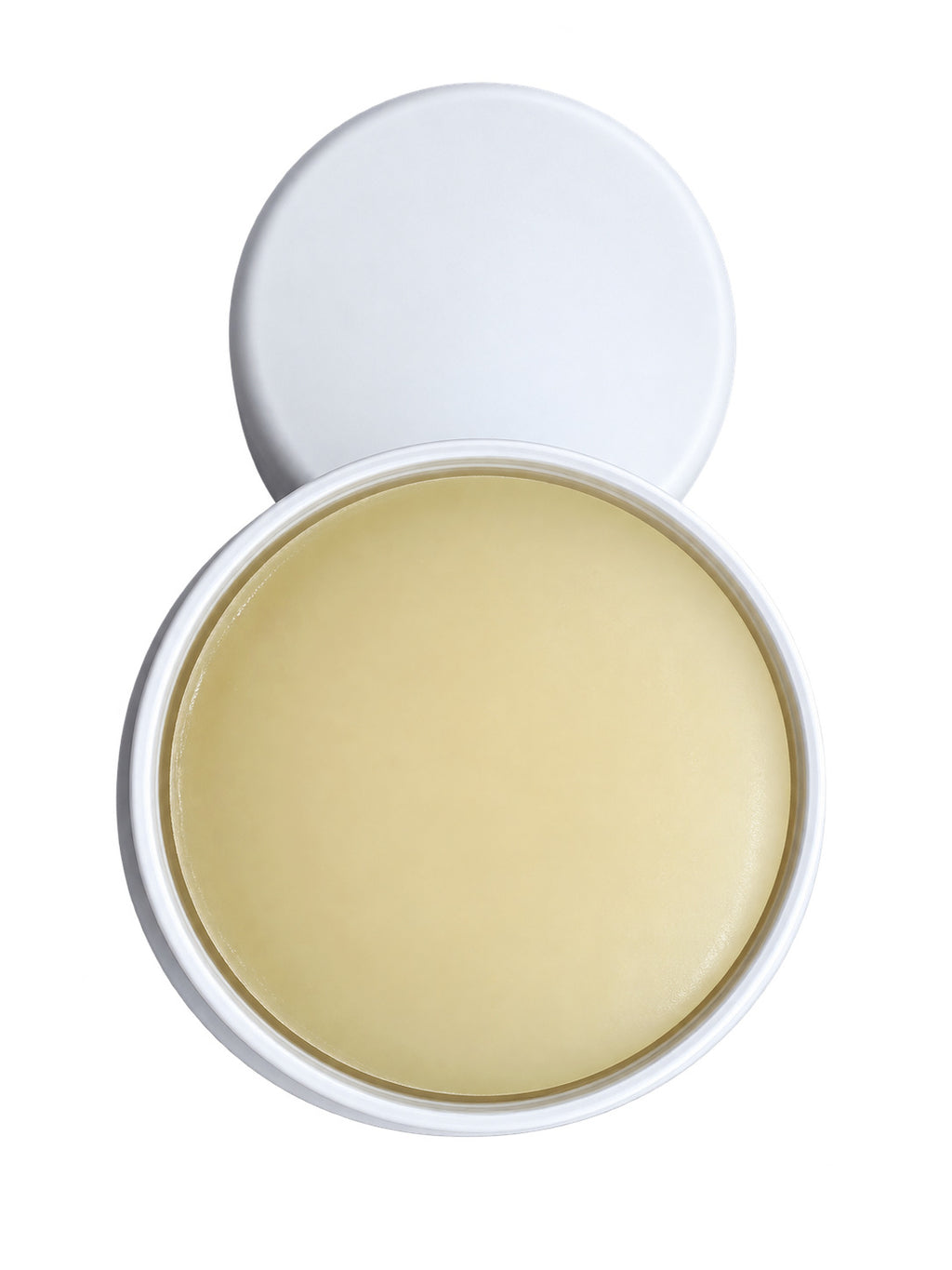 Tallow Deodorant seen from above with the cap off, showing the smooth cream-colored stick