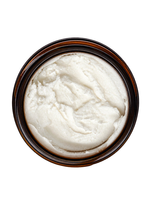 Open jar of Pure Whipped Tallow for Face seen from above, showing the white whipped texture